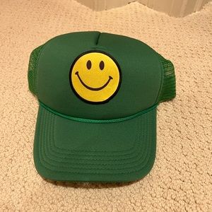 Green smiley face hat :)